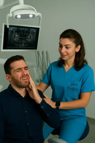 AuraDent, Emergency Dentistry Service in Northern Cyprus. Painful patient is being treated.